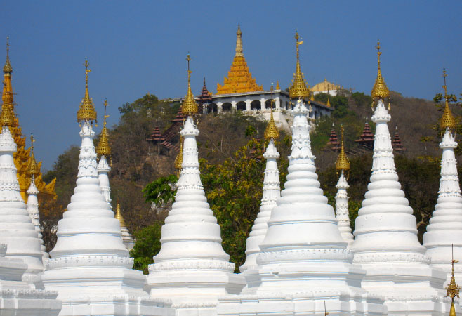 Stupas and Mandalay Hill in background
